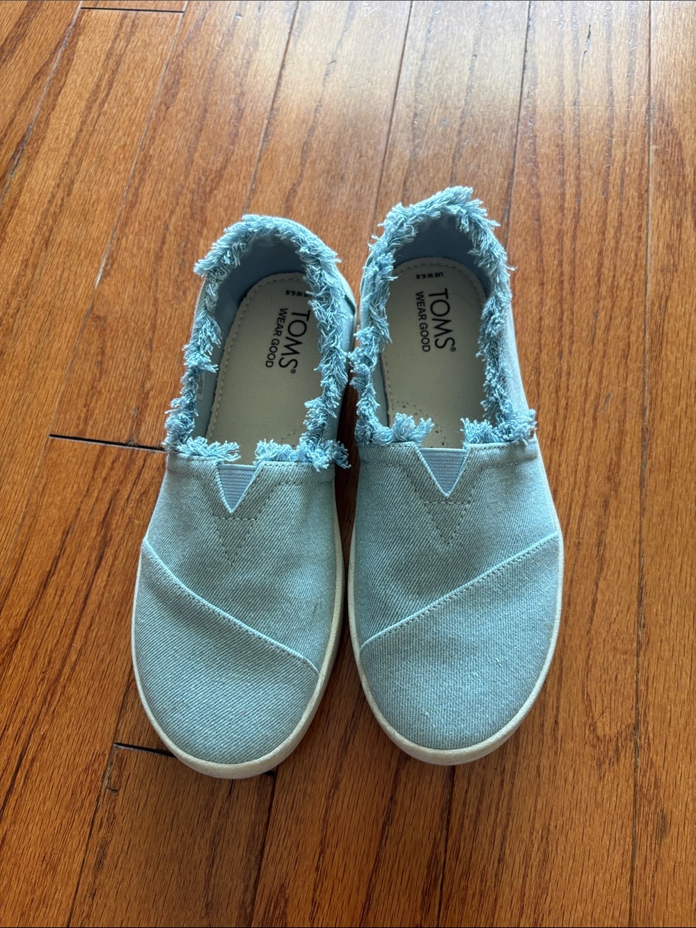 TOMS Frayed Light Blue Canvas Slip-On Sneakers